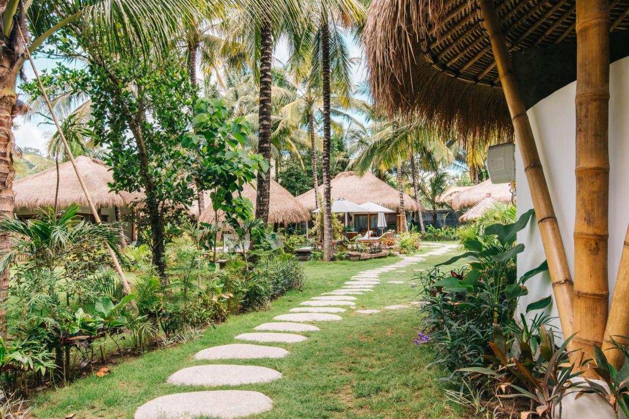 Отель Mana Eco Retreat Kuta  Экстерьер фото