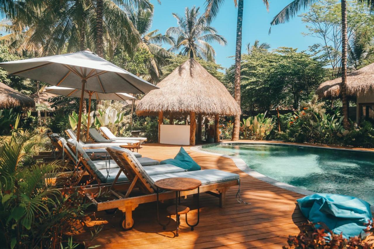 Отель Mana Eco Retreat Kuta  Экстерьер фото
