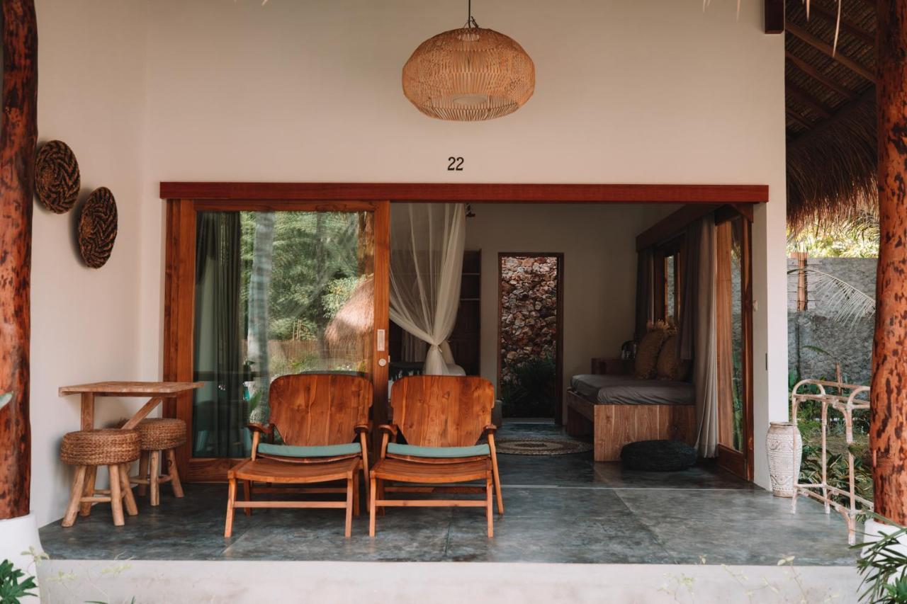 Отель Mana Eco Retreat Kuta  Экстерьер фото