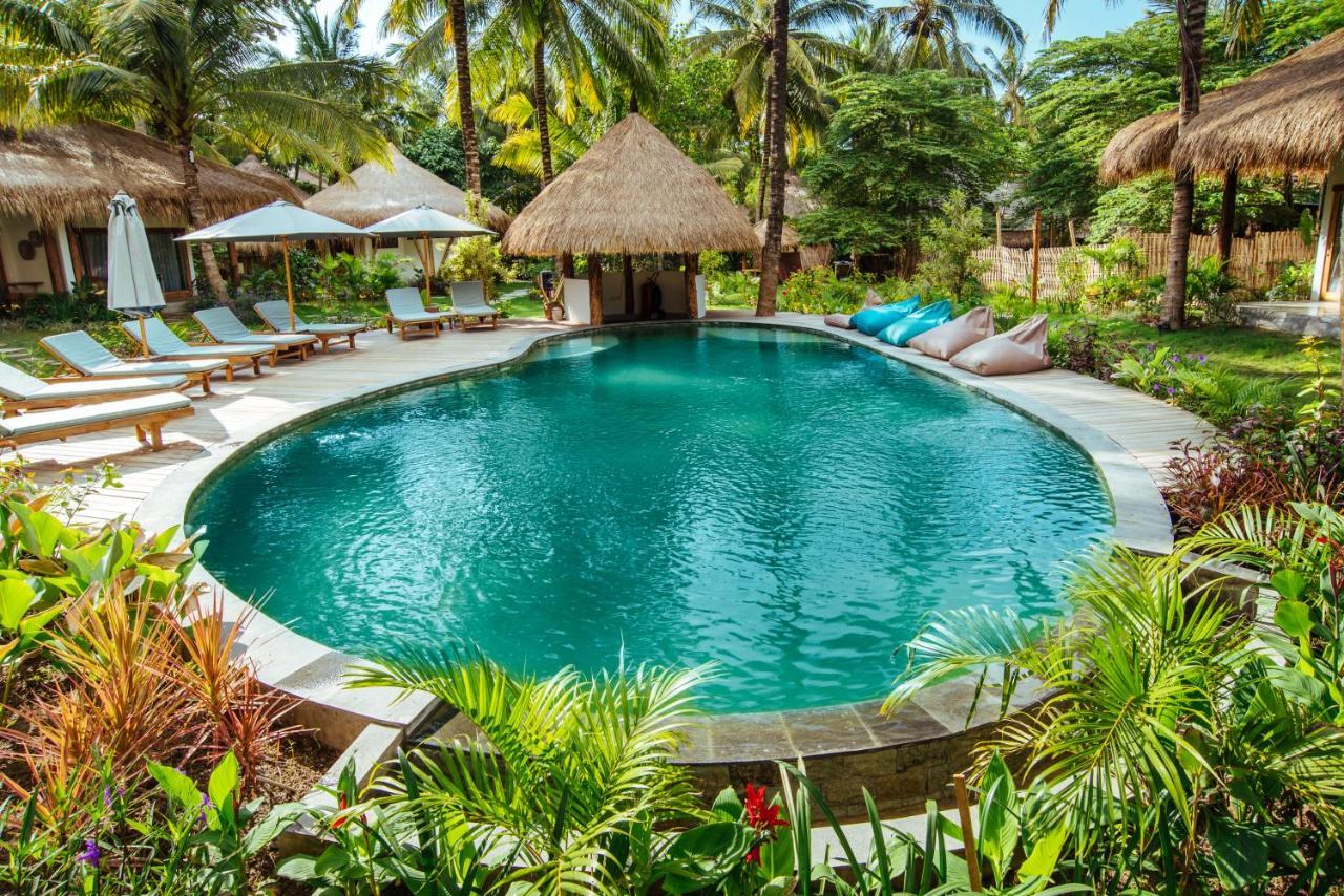 Отель Mana Eco Retreat Kuta  Экстерьер фото