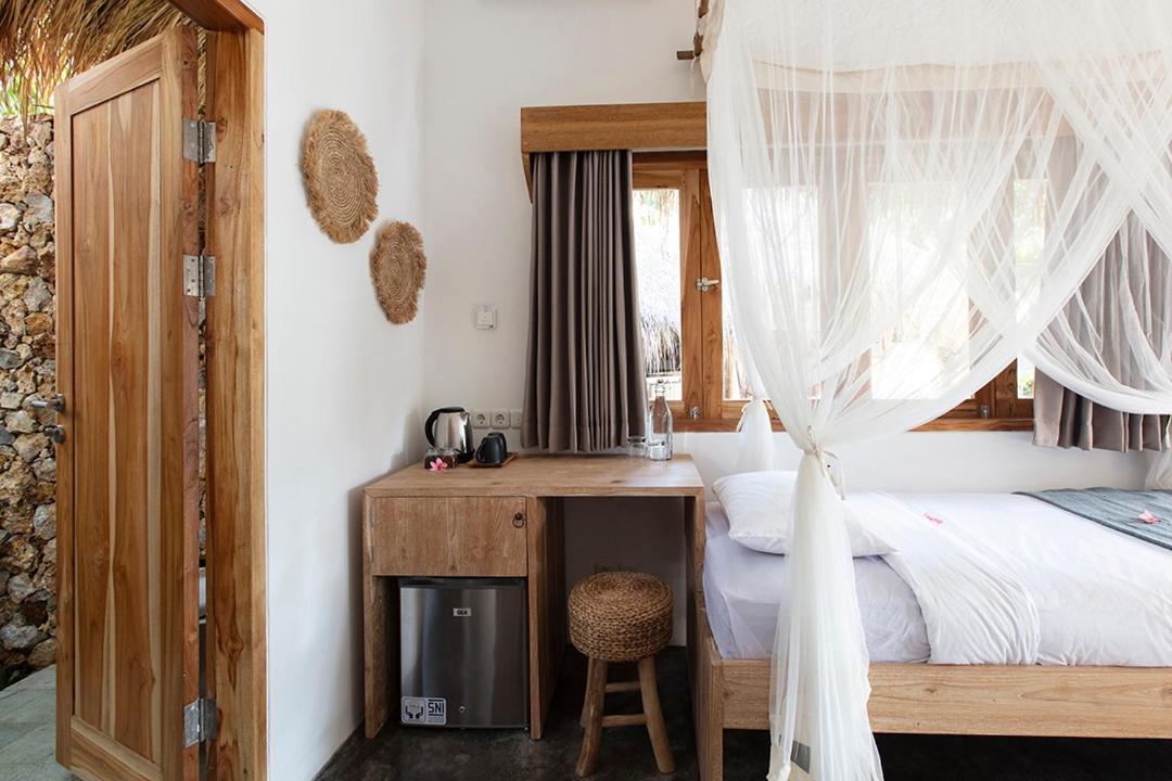 Отель Mana Eco Retreat Kuta  Экстерьер фото