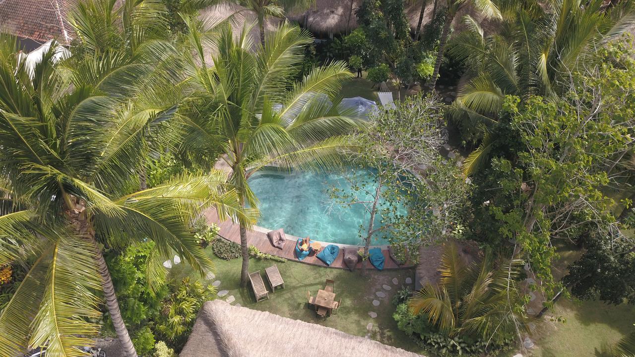 Отель Mana Eco Retreat Kuta  Экстерьер фото