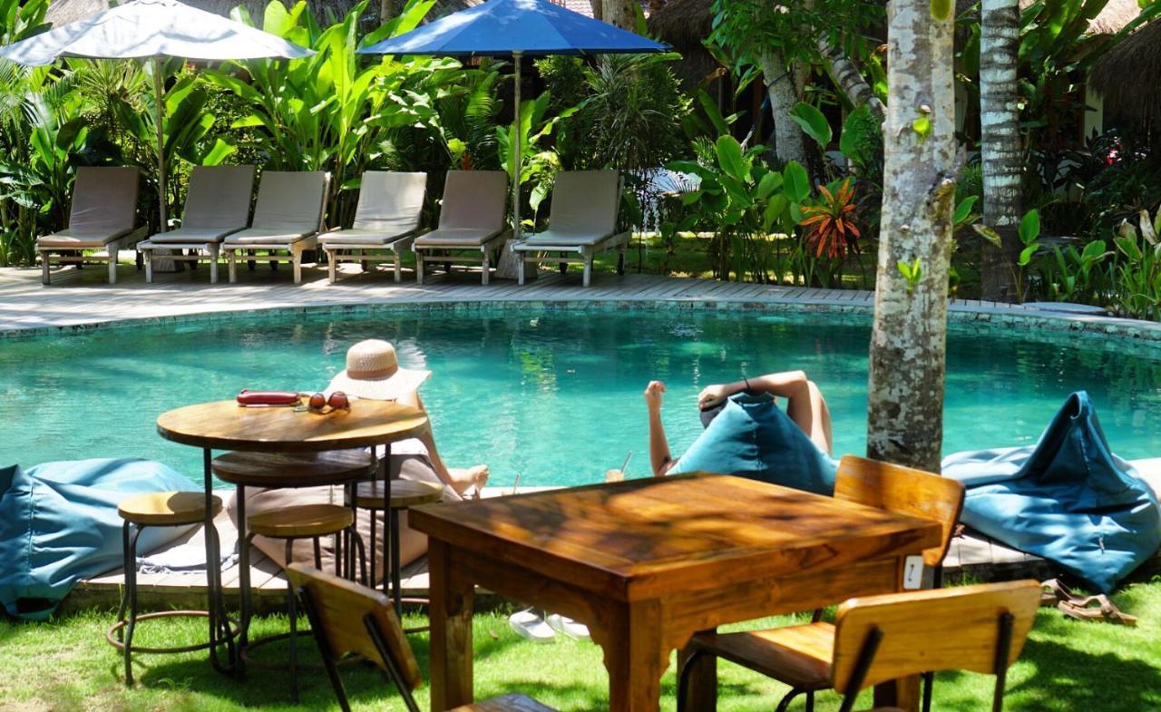 Отель Mana Eco Retreat Kuta  Экстерьер фото