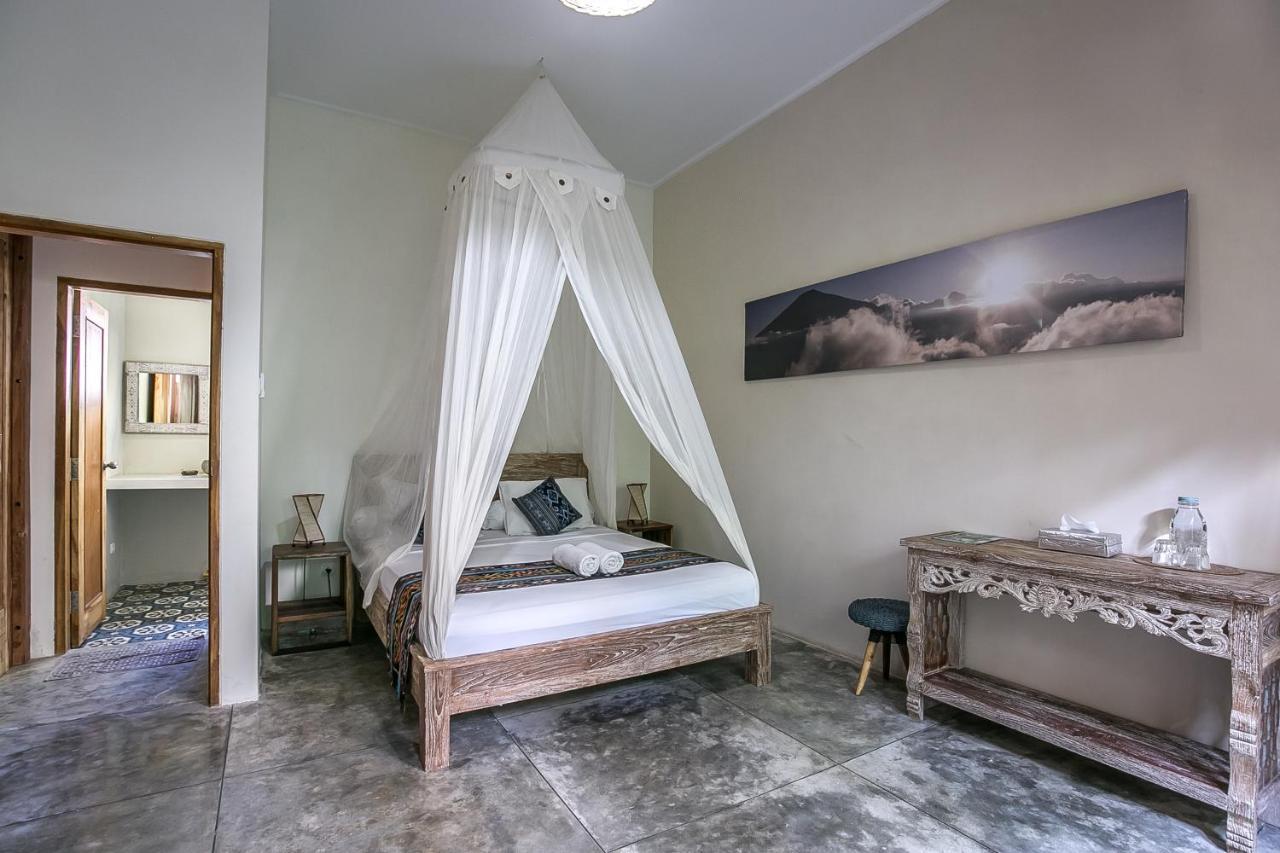 Отель Mana Eco Retreat Kuta  Экстерьер фото